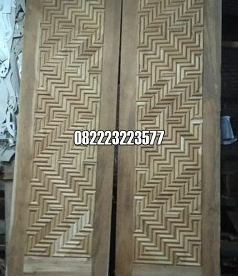 Pintu Anyaman Jati Kupu Tarung Minimalis Model Terbaru